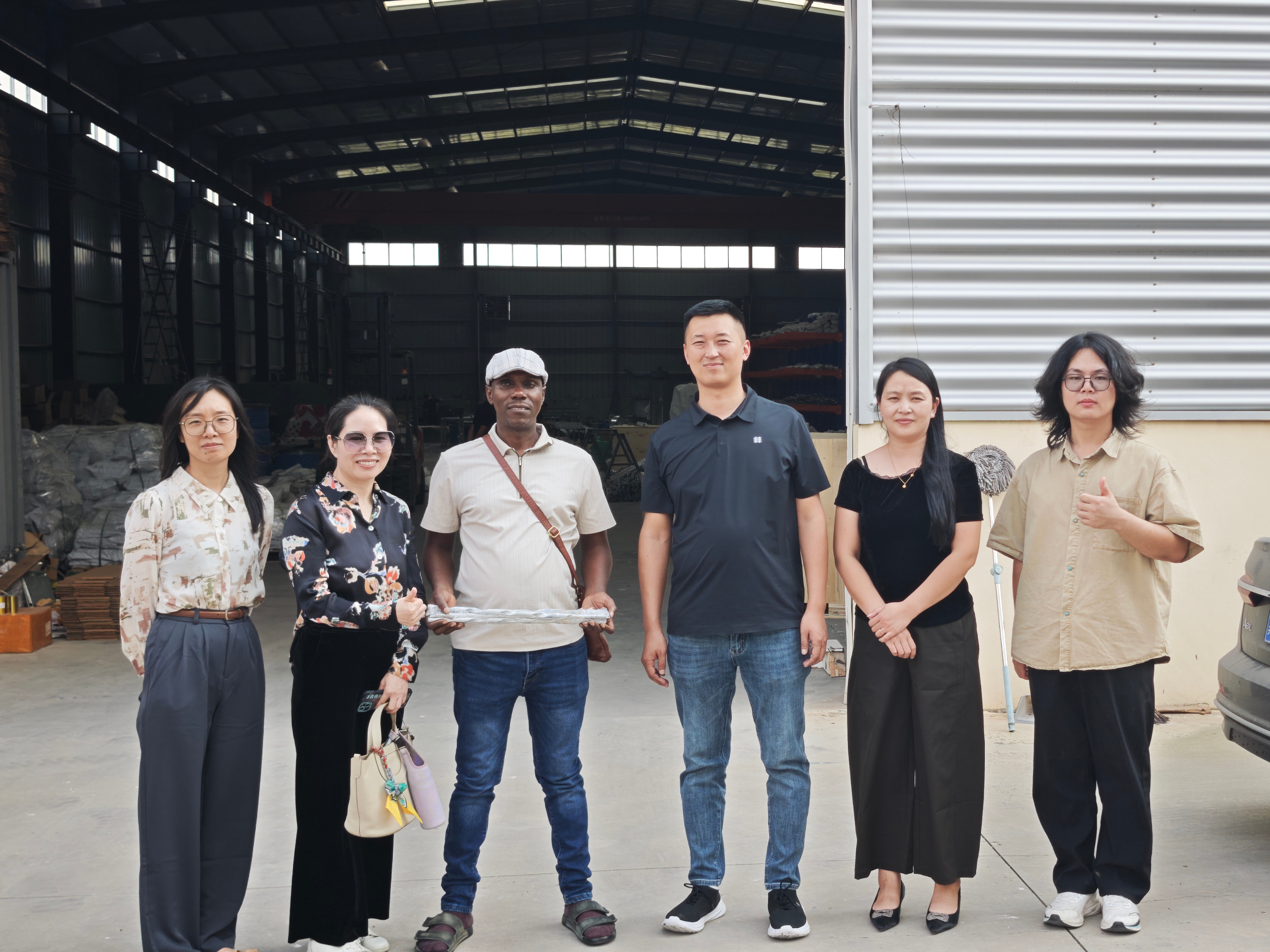 Ugandan Customers Visit Our Factory to Explore Preformed Line Products
